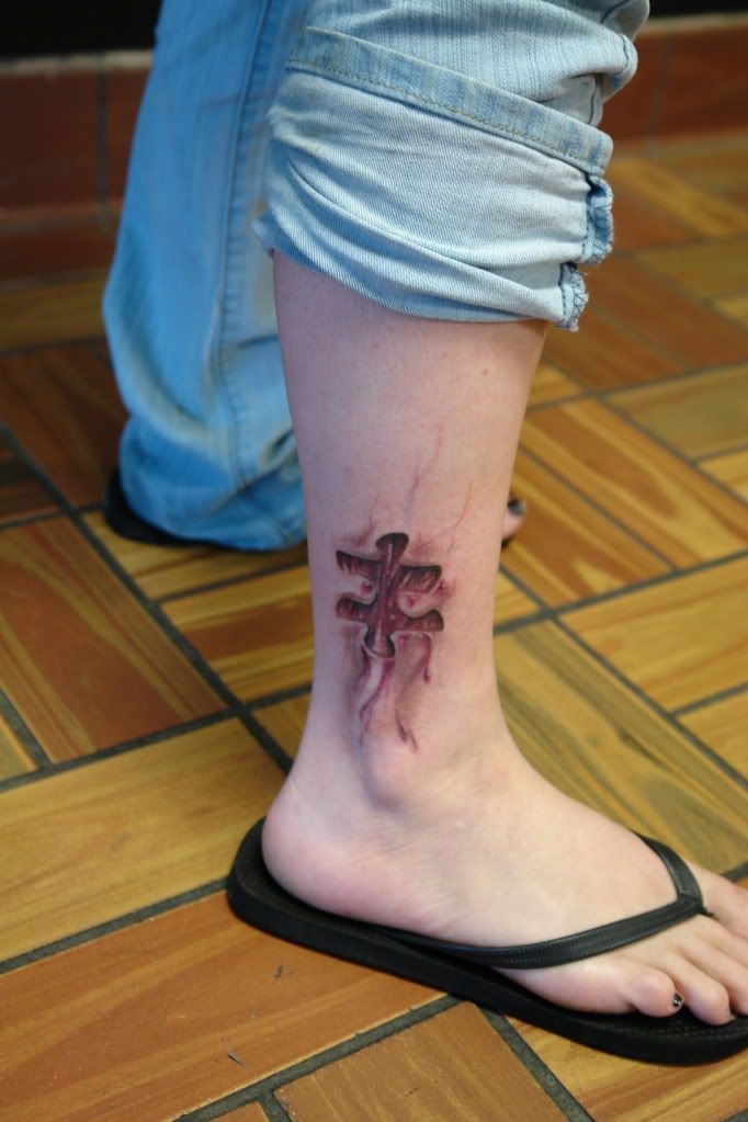 puzzle piece tattoo. 90%. Flesh