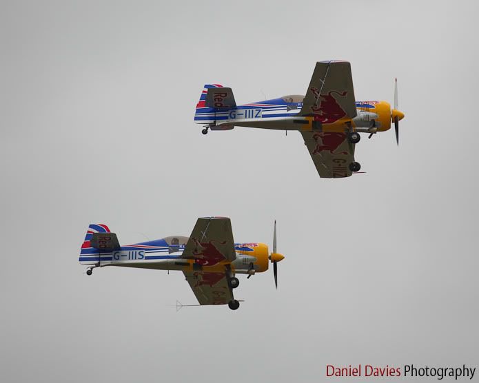 Two Suhkoi Su-26M2 flown by the Red Bull Matadors